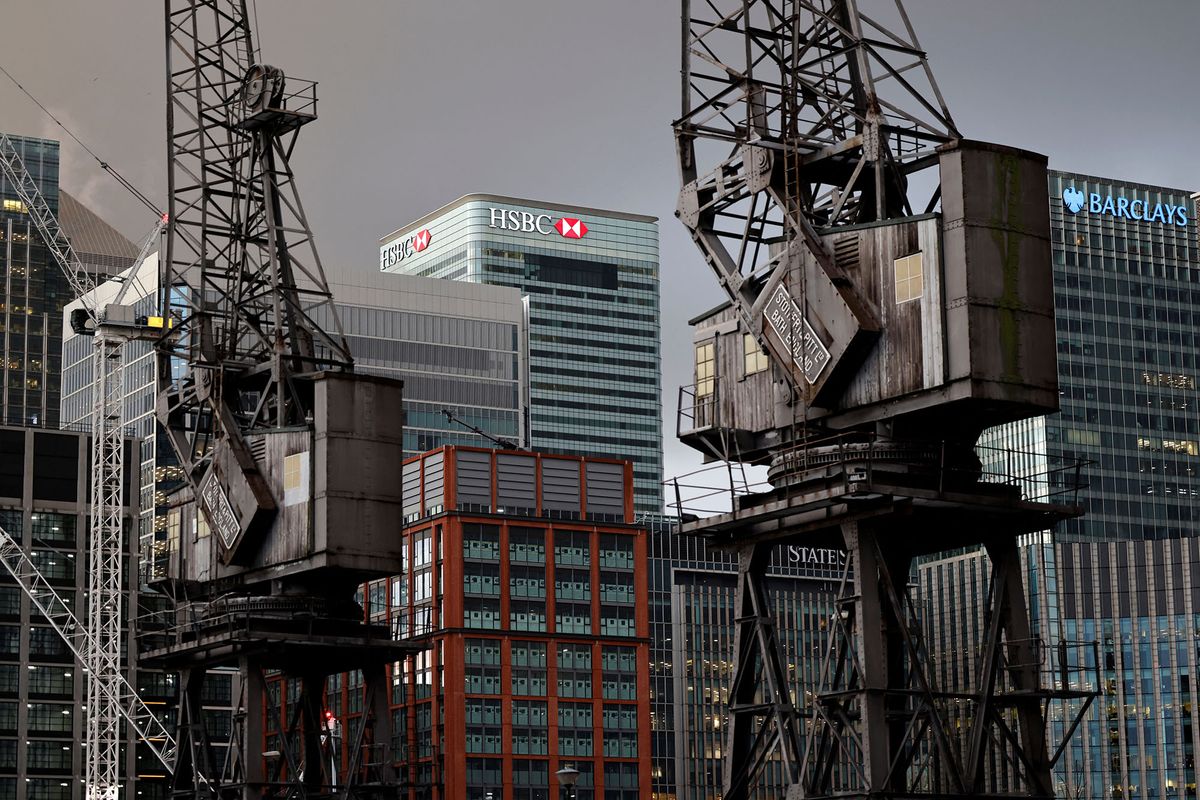 The offices of banking giants HSBC and Barclays are pictured at the the secondary central business district of Canary Wharf on the Isle of Dogs, east London on December 11, 2020. - A Brexit trade deal between Britain and the European Union looked to be hanging in the balance on Friday, after leaders on both sides of the Channel gave a gloomy assessment of progress in last-gasp talks. The Bank of England said Friday that UK banks remained "resilient" to the risks of Brexit and coronavirus, but warned financial services could face "disruption" when the transition period ends. (Photo by Tolga Akmen / AFP)