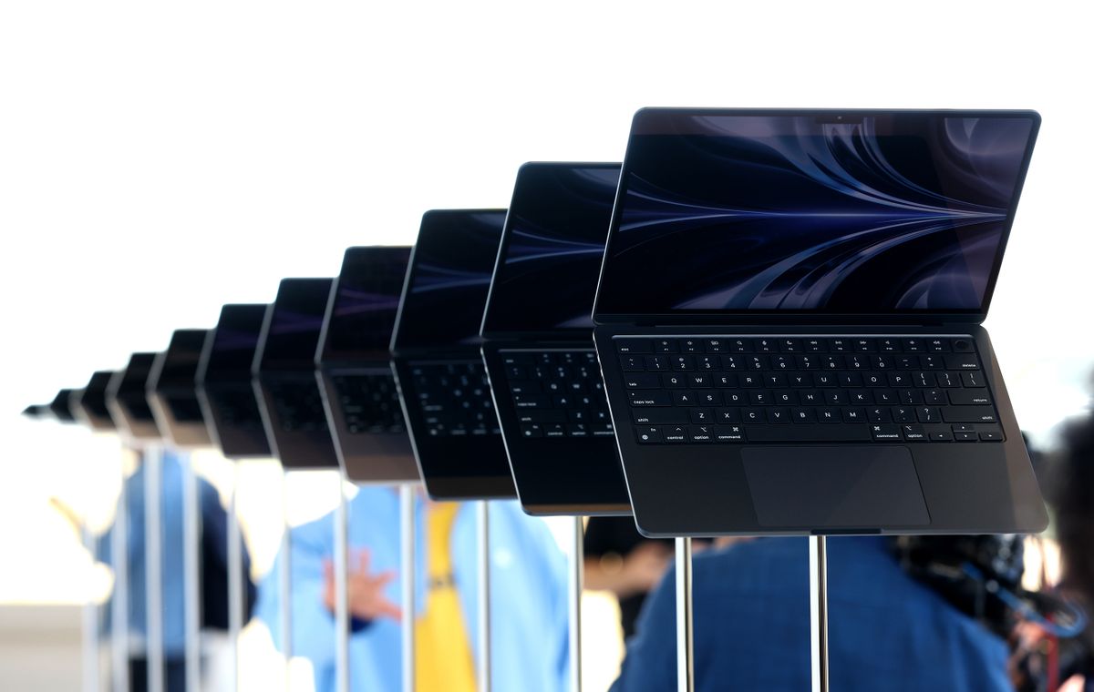 CUPERTINO, CALIFORNIA - JUNE 06: Newly redesigned MacBook Air laptops are seen displayed during the WWDC22 at Apple Park on June 06, 2022 in Cupertino, California. Apple CEO Tim Cook kicked off the annual WWDC22 developer conference.  