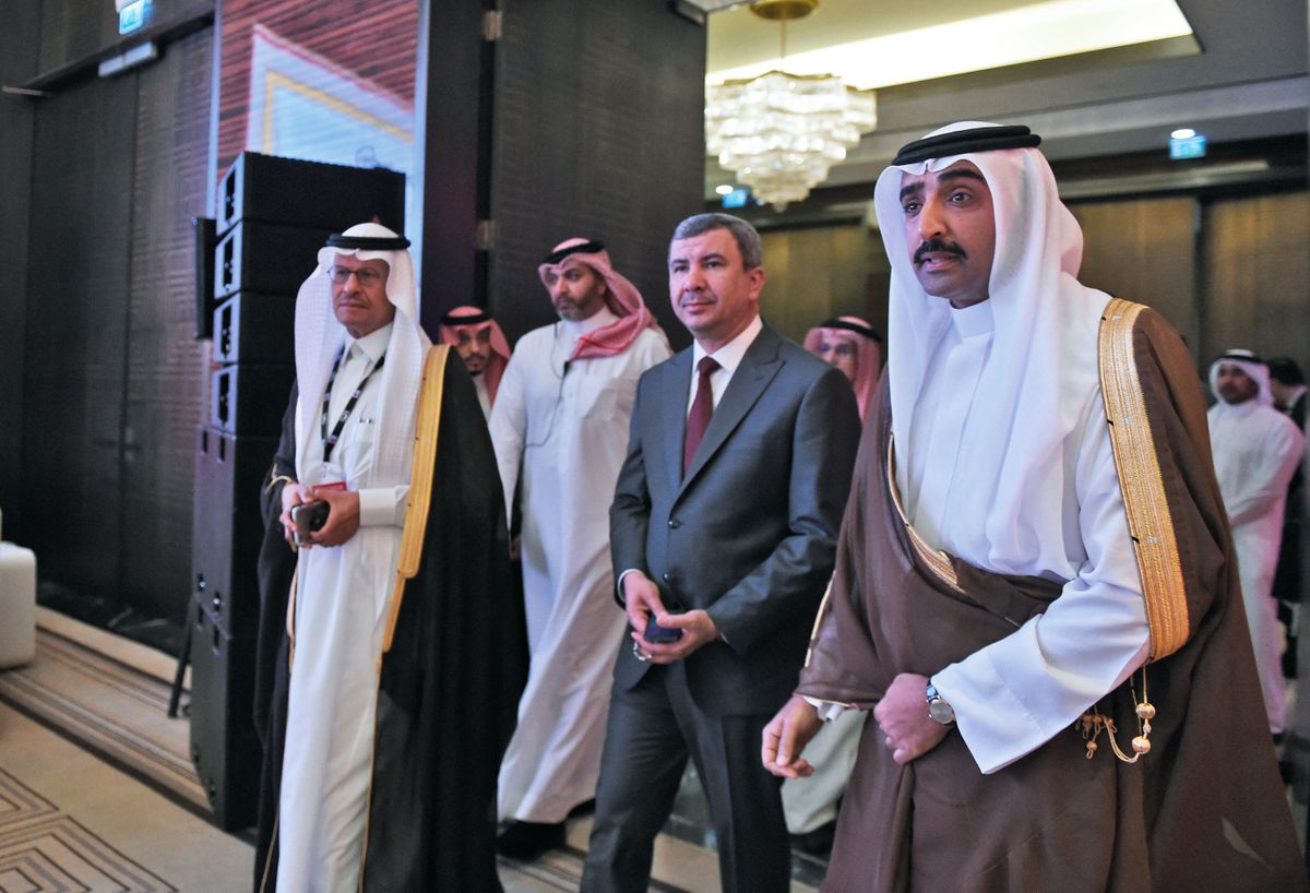 Bahraini Minister of Oil and Gas sheikh Mohammed bin Khalifa bin Ahmed Al Khalifa (R), Iraqi Oil Minister Ihsan Abdul-Jabbar Ismail (C) and Saudi Energy Minister Abdulaziz bin Salman bin Abdulaziz Al Saud (L) arrive to attend the 29th annual Middle East Petroleum and Gas conference in the Bahraini capital Manama, on May 16, 2022. (Photo by Mazen Mahdi / AFP)
