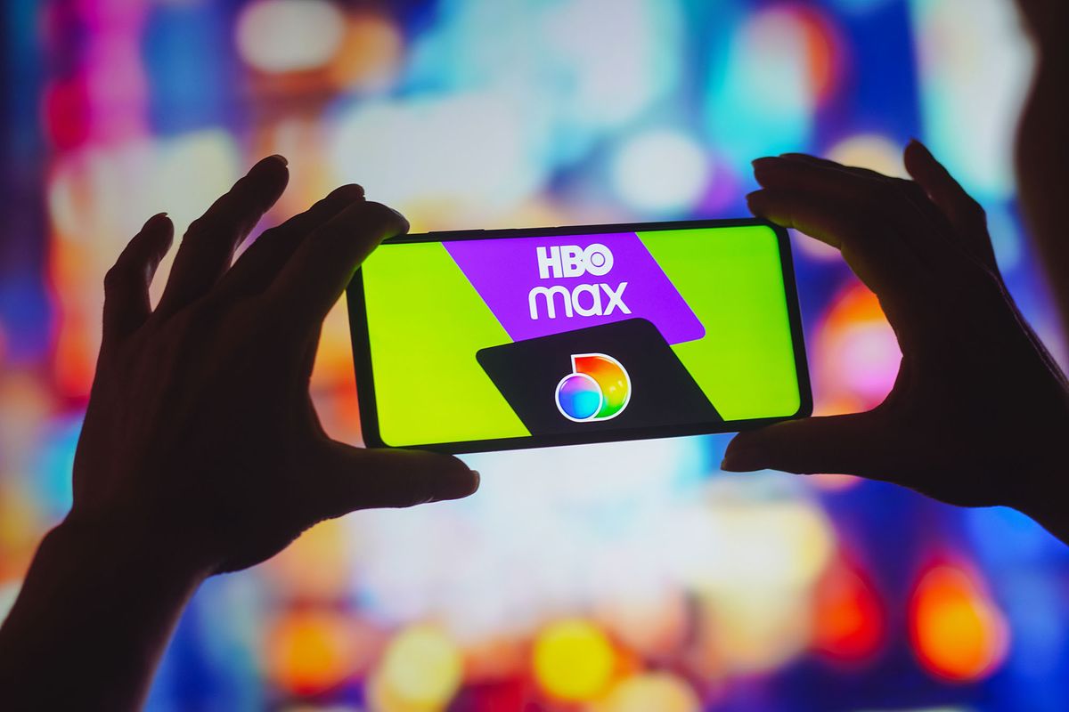1242329142 BRAZIL - 2022/08/05: In this photo illustration, the HBO Max and Discovery Plus logos is displayed on a smartphone screen. (Photo Illustration by Rafael Henrique/SOPA Images/LightRocket via Getty Images)