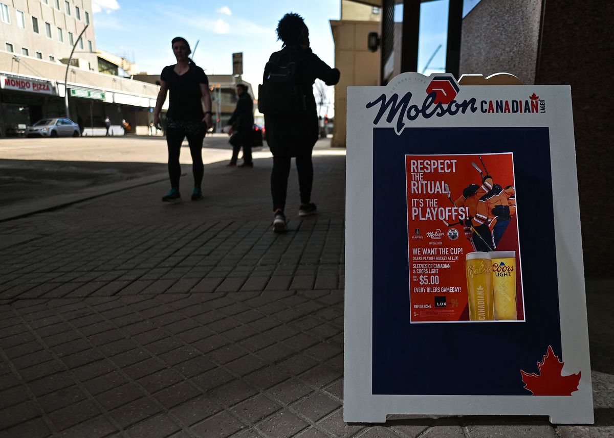 Advertising for Molson Canadian beer outside a bar in downtown Edmonton.On Thursday, May 5, 2022, in Edmonton, Alberta, Canada. (Photo by Artur Widak/NurPhoto) (Photo by Artur Widak / NurPhoto / NurPhoto via AFP)