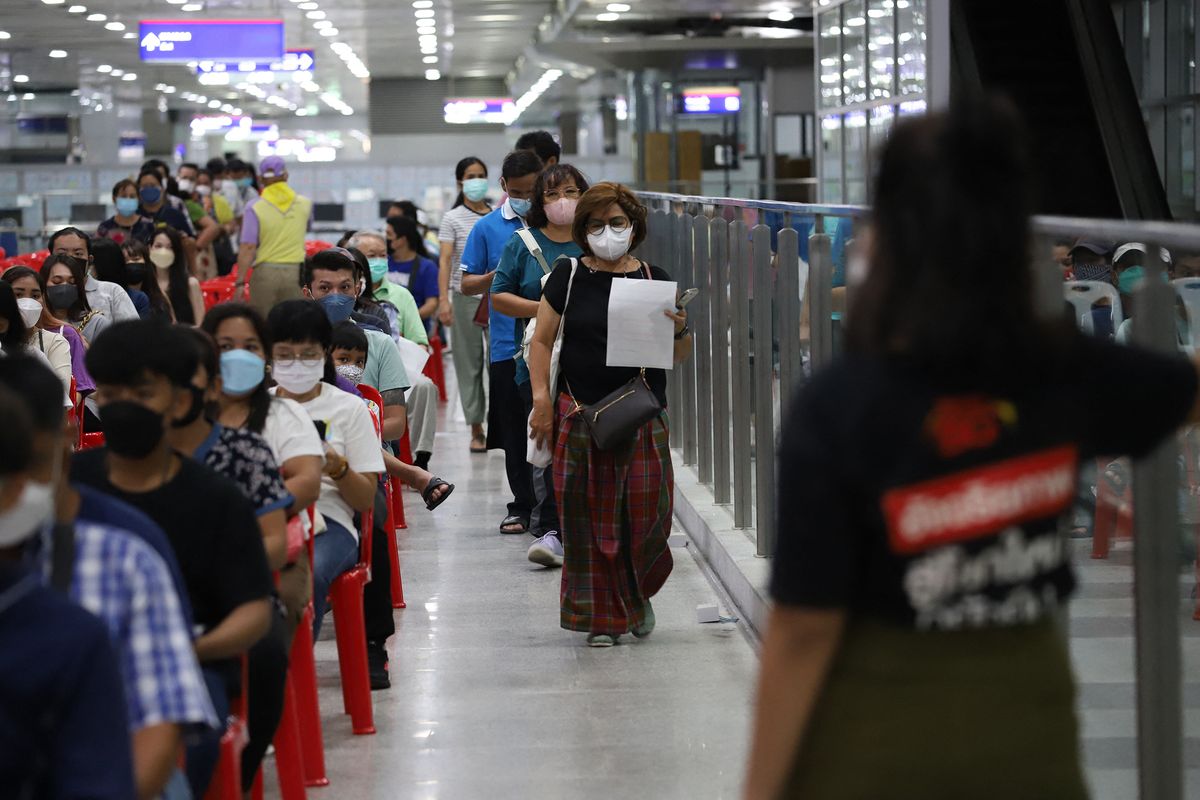 People wait to receive Covid-19 vaccinations at Bang Sue Grand Station vaccination centre in Bangkok, Thailand, on July 6, 2022. BANGKOK POST PHOTO/Varuth  Hirunyatheb 