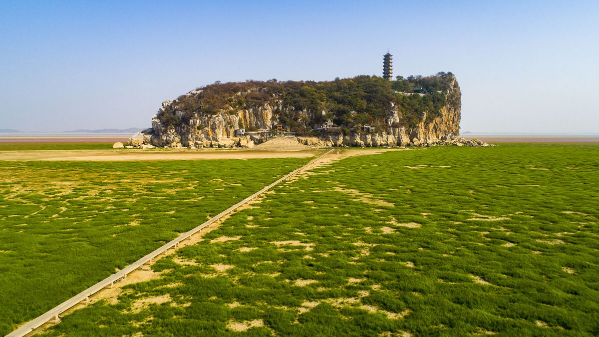 JIANGXI, CHINA - OCTOBER 30: (CHINA MAINLAND OUT)A small island shows up at the bottom of Poyang lake at dry season 