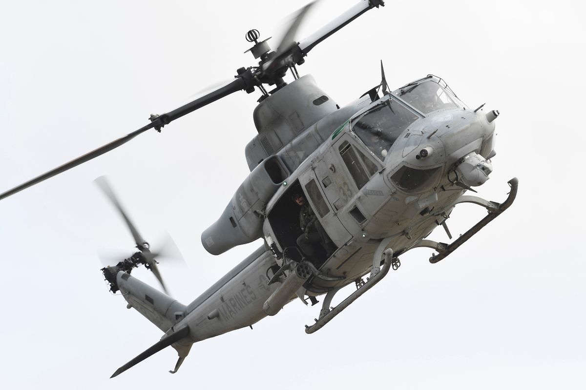 BOWEN, AUSTRALIA - JULY 22: A U.S Marine Venom helicopter does a fly over at the Bowen airport on July 22, 2019 in Bowen, Australia. Exercise Talisman Sabre 2019 is the largest exercise that the Australian Defence Force (ADF) conducts with all four services of the United States armed forces. The biennial exercise focuses on crisis action planning and humanitarian missions, enhancing participating nations' capabilities to deal with regional contingencies and terrorism. It is the first time the NZDF has been invited to participate fully, with NZDF personnel to be working as part of a large force led by the Australians and NZDF military assets will be integrated with those of the ADF and the US armed forces. 