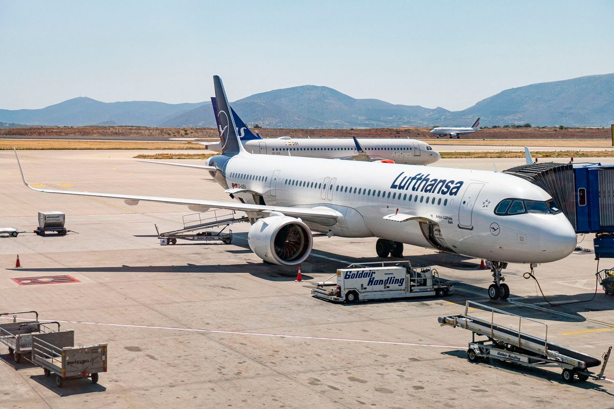 Lufthansa Airbus A321neo aircraft as seen parked and docked to an airbridge in Athens International Airport ATH. The modern A321 NEO airplane of the German airliner has the registration D-AIEH and the name Suhl. Deutsche Lufthansa is the flag carrier of Germany, being the second largest airline in Europe, member of Star Alliance aviation group. Lufthansa recently faced flight cancellations because of staff and pilot strikes with thousands of passengers loosing their flights. During the summer of 2022 the European Aviation industry is facing long delays, cancellations and a travel chaos mostly because of staff shortages at the airports after the Covid-19 Coronavirus pandemic era, air travel had an increased demand. Despite the situation Greek airports are performing well. Athens, Greece on July 31, 2022 (Photo by Nicolas Economou/NurPhoto) (Photo by Nicolas Economou / NurPhoto / NurPhoto via AFP)