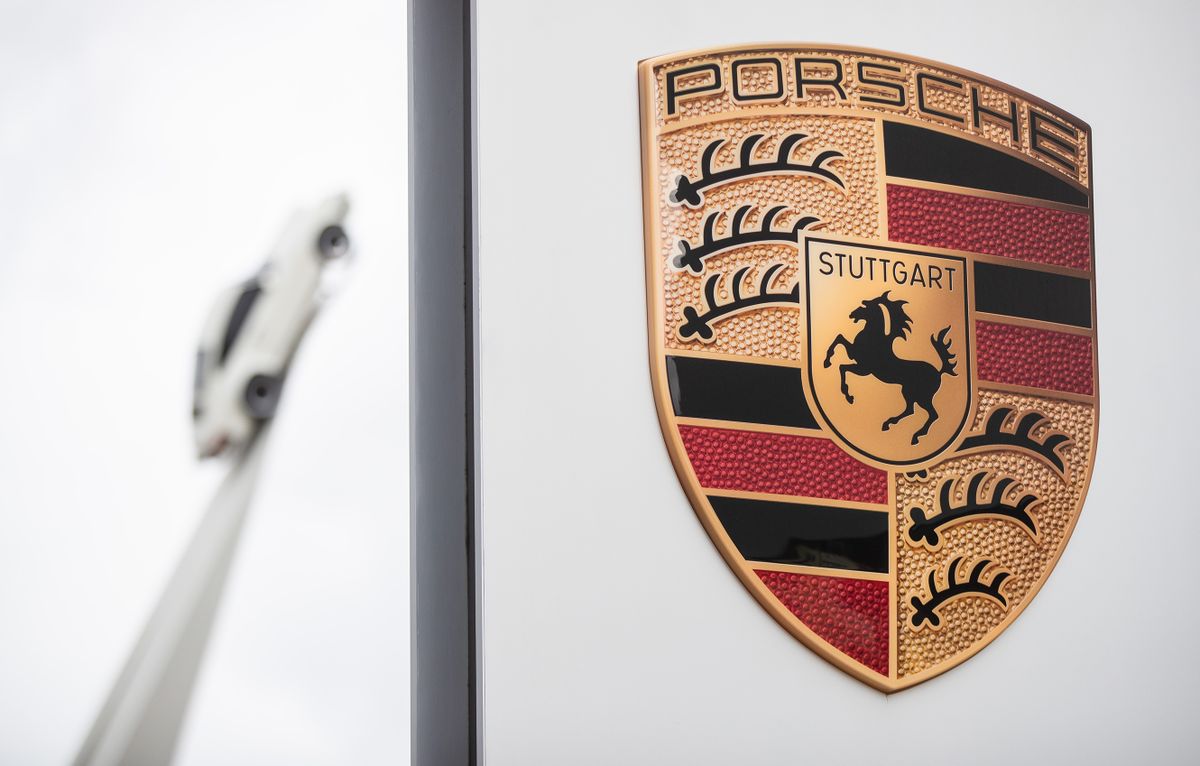 22 February 2022, Baden-Wuerttemberg, Stuttgart: The Porsche logo can be seen on a large sign at the company's headquarters in Stuttgart-Zuffenhausen. The Volkswagen Group wants to take its sports car subsidiary Porsche AG public. 