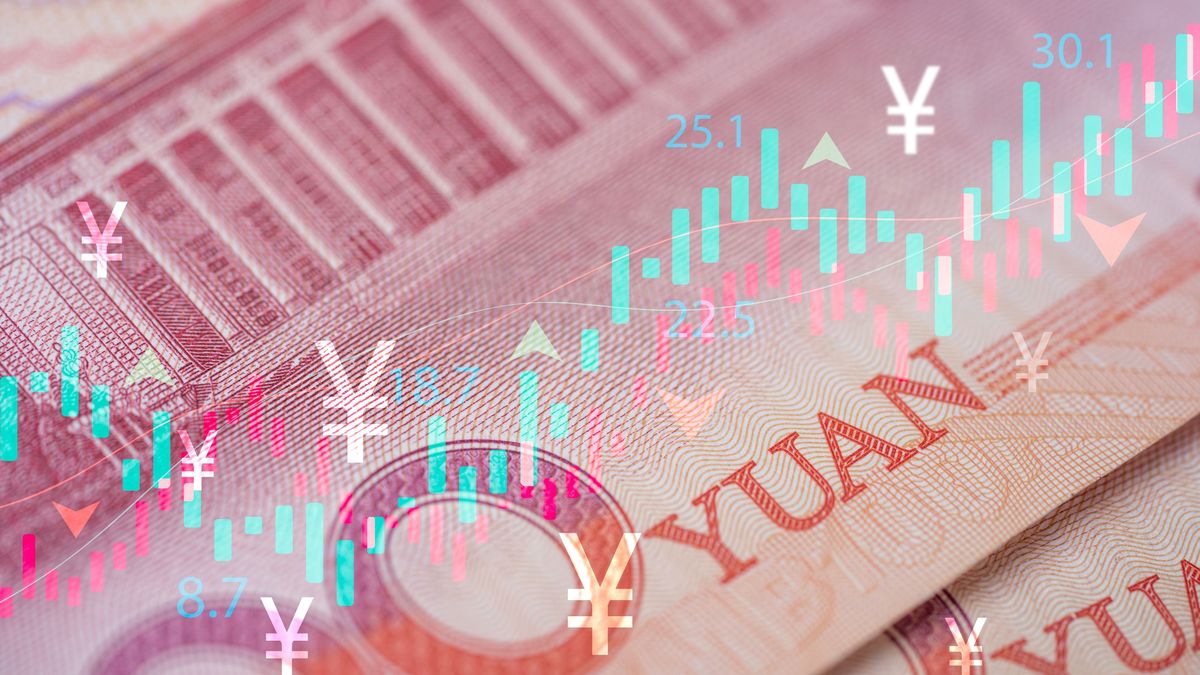 Heap,Of,Yuan,Banknotes,With,Stock,Market,Graph,Chart,And Heap of Yuan banknotes with stock market graph chart and Yuan symbol for Trading currency exchange and money transfer concept. Heap of Yuan banknotes with stock market graph chart and Yuan symbol for Trading currency exchange and money transfer concept.