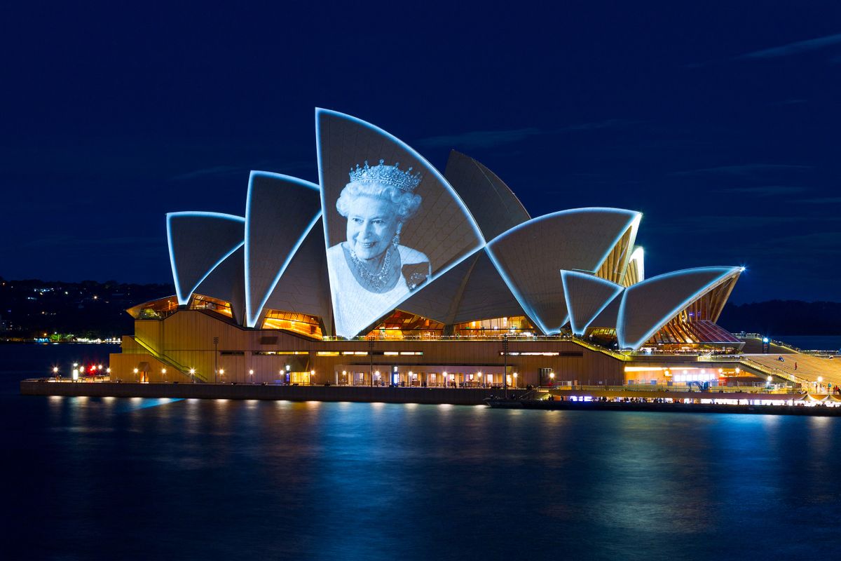 Australia iconic Opera House sails lit up with the picture of Britain's Queen Elizabeth II to commemorate her life on September 9, 2022, in Sydney. 