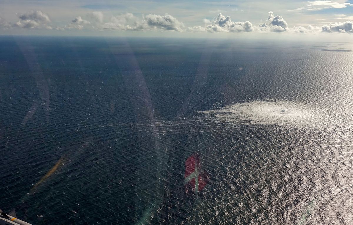 This handout picture released on September 27, 2022 by the Danish Defence Command shows the gas leak at the Nord Stream 2 gas pipeline as it is seen from the Danish Defence's F-16 rejection response off the Danish Baltic island of Bornholm, south of Dueodde. - The two Nord Stream gas pipelines linking Russia and Europe have been hit by unexplained leaks, Scandinavian authorities said on September 27, 2022, raising suspicions of sabotage. The pipelines have been at the centre of geopolitical tensions in recent months as Russia cut gas supplies to Europe in suspected retaliation against Western sanctions following its invasion of Ukraine. 