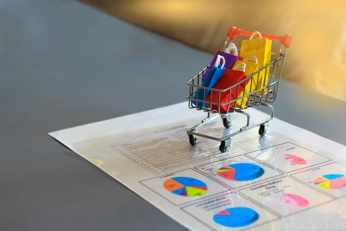 Ecommerce,Shopping,And,Market,Share,Concepts:,Putting,Trolley,On,Report, Ecommerce Shopping and Market Share Concepts: Putting Trolley on Report Paper in the Office. Ecommerce Shopping and Market Share Concepts: Putting Trolley on Report Paper in the Office.