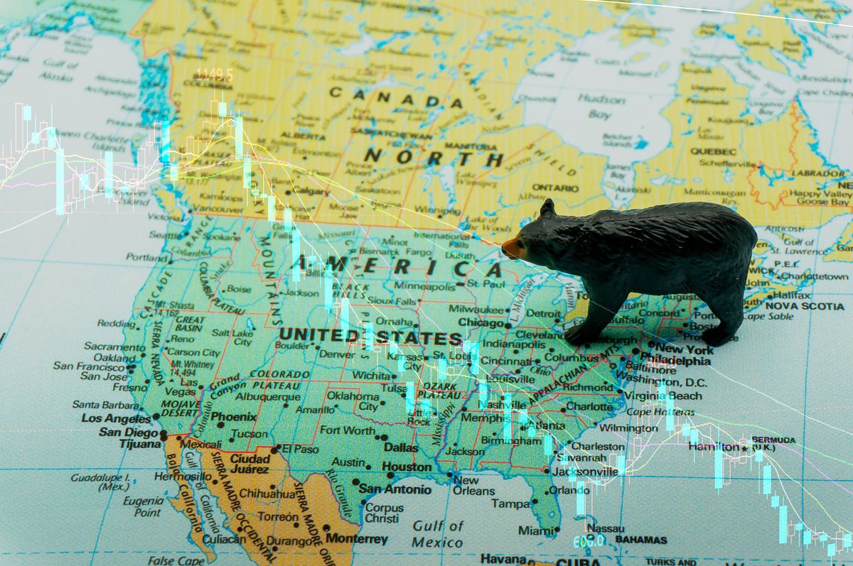 Black,Bear,Placed,On,A,Map,Of,The,United,States. black bear placed on a map of the United States. a bear market, a fall in the stock market. Economic downturn, financial crisis.bearish.down trend investment,US stocksï¼ŒStock k-line double exposure, black bear placed on a map of the United States. a bear market, a fall in the stock market. Economic downturn, financial crisis.bearish.down trend investment,US stocksï¼ŒStock k-line double exposure
