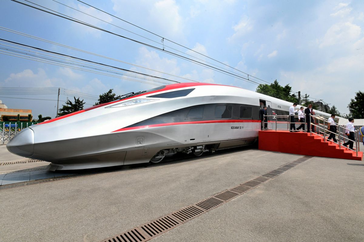 CHINA-SHANDONG-QINGDAO-JAKARTA-BANDUNG HIGH-SPEED RAILWAY-TRAIN (CN) (220821) -- QINGDAO, Aug. 21, 2022 (Xinhua) -- Photo taken on Aug. 5, 2022 shows a high-speed electric passenger train, customized for the Jakarta-Bandung high-speed railway, in Qingdao, east China's Shandong province. A set of passenger trains and a inspection train will be transported to Indonesia, marking important progress in the construction of the railway, a landmark project under the Belt and Road Initiative. (Xinhua/Li Ziheng) (Photo by Li Ziheng / XINHUA / Xinhua via AFP) CHINA-SHANDONG-QINGDAO-JAKARTA-BANDUNG HIGH-SPEED RAILWAY-TRAIN