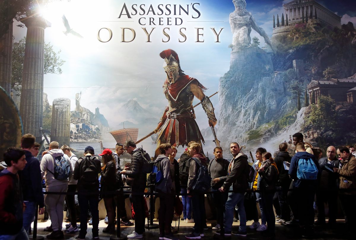 PARIS, FRANCE - OCTOBER 27:  Visitors queue to play the video game  'Assassin's Creed Odyssey' developed by Ubisoft Quebec and published by Ubisoft during the 'Paris Games Week' on October 27, 2018 in Paris, France. 'Paris Games Week' is an international trade fair for video games and runs from October 26 to 31, 2018. 