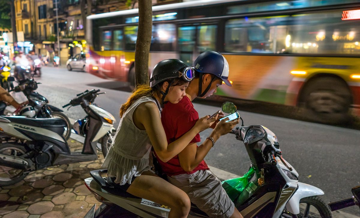 Hanoi,,Vietnam,-,Aug,12,,2016:,Teenagers,Busy,Using,Smartphone