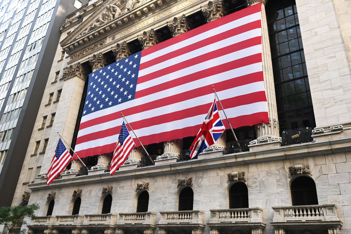 The British flag is displayed outside the New York Stock Exchange to honor Britain's Queen Elizabeth II, in New York on September 9, 2022. - Queen Elizabeth II, the longest-serving monarch in British history and an icon instantly recognisable to billions of people around the world, died at her Scottish Highland retreat on September 8, at the age of 96. (Photo by Andrea RENAULT / AFP)