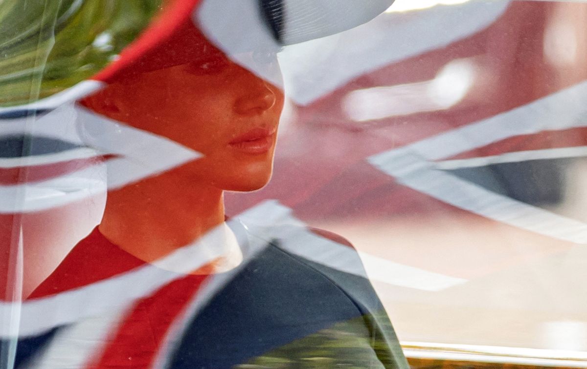 Britain's Meghan, Duchess of Sussex sits in a car as she attends Britain's Queen Elizabeth state funeral and burial, in London, Britain, September 19, 2022. (Photo by MARKO DJURICA / POOL / AFP)