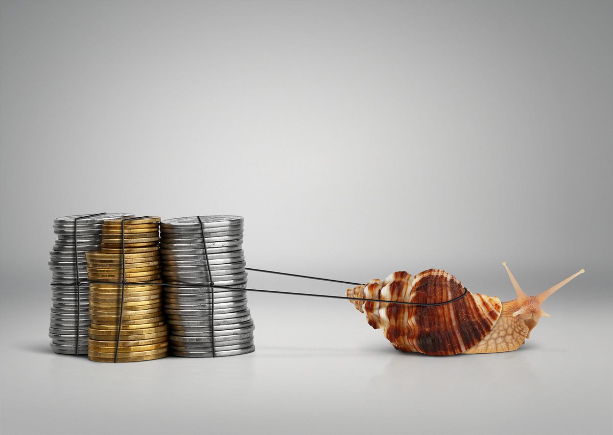 Banking,Concept,Snail,Pulling,Money,With,Copy,Space