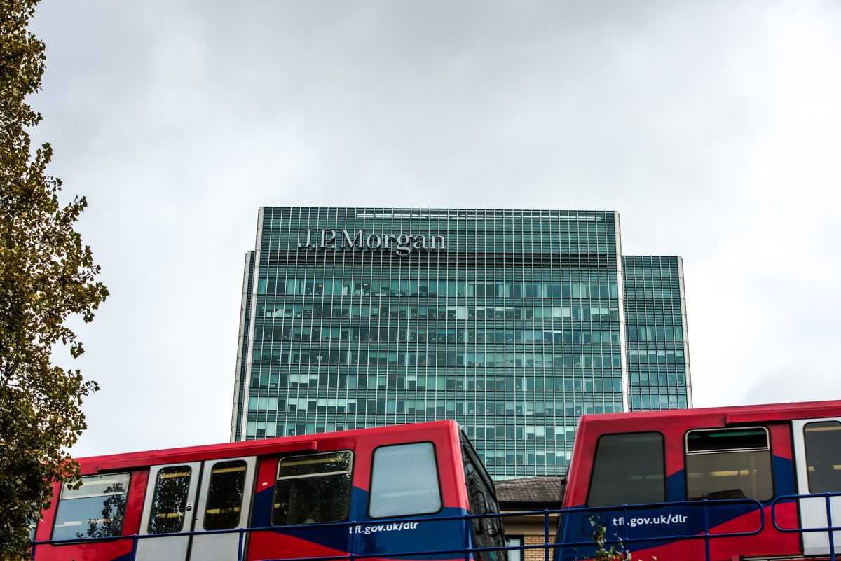 A Docklands Light Railway (DLR) passes front JP Morgan, CANARY WHARF, LONDON, UNITED KINGDOM - 2017/09/20: A Docklands Light Railway (DLR) passes front JP Morgan building in the Canary Wharf financial, business and shopping district in London UK. (Photo by Brais G Rouco/SOPA Images/LightRocket via Getty Images) CANARY WHARF, LONDON, UNITED KINGDOM - 2017/09/20: A Docklands Light Railway (DLR) passes front JP Morgan building in the Canary Wharf financial, business and shopping district in London UK. (Photo by Brais G Rouco/SOPA Images/LightRocket via Getty Images)