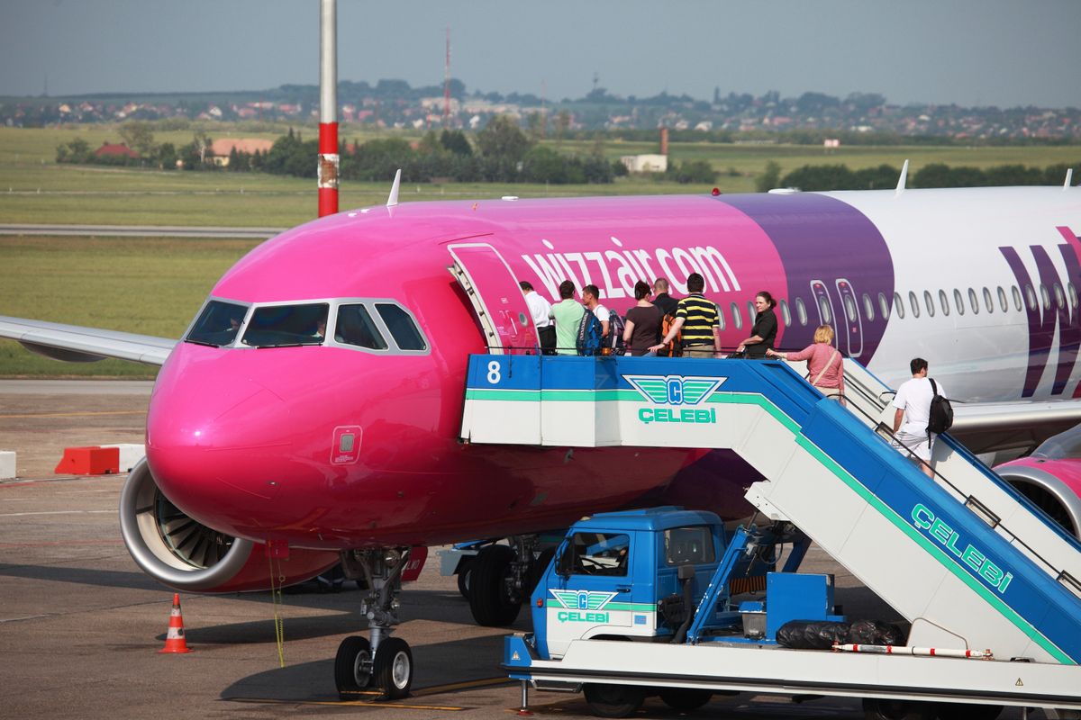 Budapest,,Hungary,-,May,5:,Passengers,Boarding,A,Wizzair,Airliner