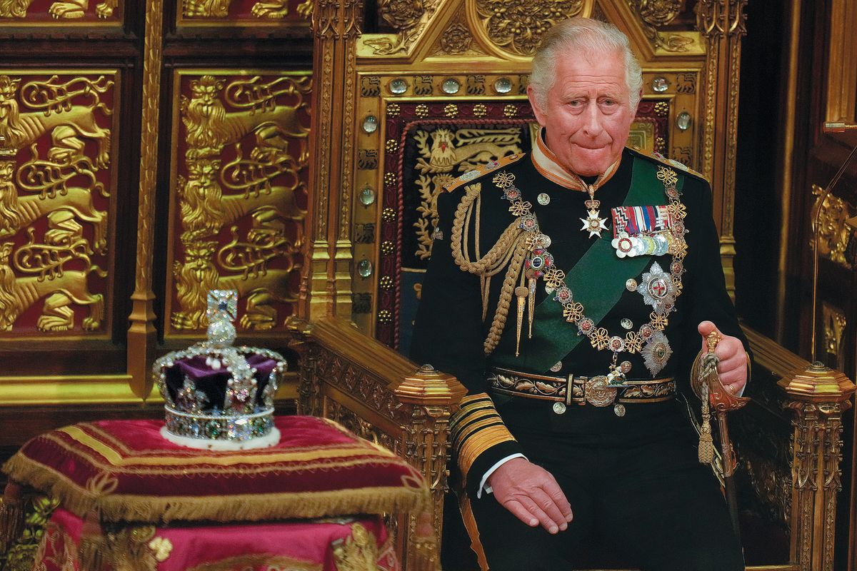 State Opening Of Parliament 2022, LONDON, ENGLAND - MAY 10: Prince Charles, Prince of Wales seated next to the Queen's Imperial State Crown in the House of Lords Chamber, during the State Opening of Parliament in the House of Lords at the Palace of Westminster on May 10, 2022 in London, England. The State Opening of Parliament formally marks the beginning of the new session of Parliament. It includes Queen's Speech, prepared for her to read from the throne, by her government outlining its plans for new laws being brought forward in the coming parliamentary year. This year the speech will be read by the Prince of Wales as HM The Queen will miss the event due to ongoing mobility issues. (Photo by Alastair Grant - WPA Pool/Getty Images)