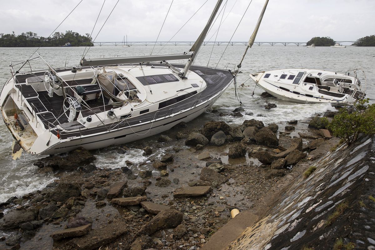 Hurricane Fiona leaves a second fatality in the Dominican Republic,  epa10195900 A boat stranded on the seashore after the passage of Hurricane Fiona, in Samana, Dominican Republic, 20 September 2022. Hurricane Fiona caused a second fatality in the Dominican Republic, an 18-year-old girl, when a power pole fell on her due to the wind in the province of La Altagracia in the east of the country.  EPA/Orlando Barria
