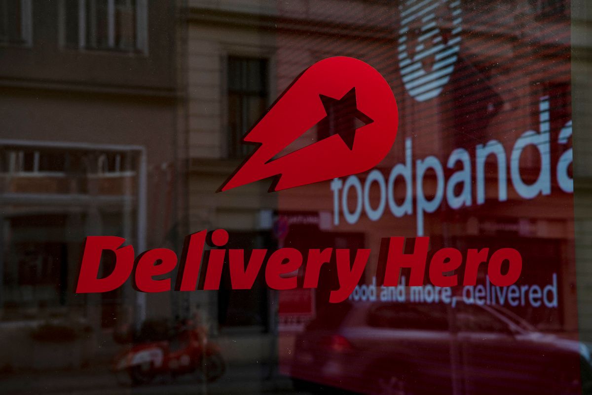 Delivery Hero
11 February 2022, Berlin: The logo and lettering of the food delivery service Delivery Hero is on a window pane at the Dax company's headquarters. 