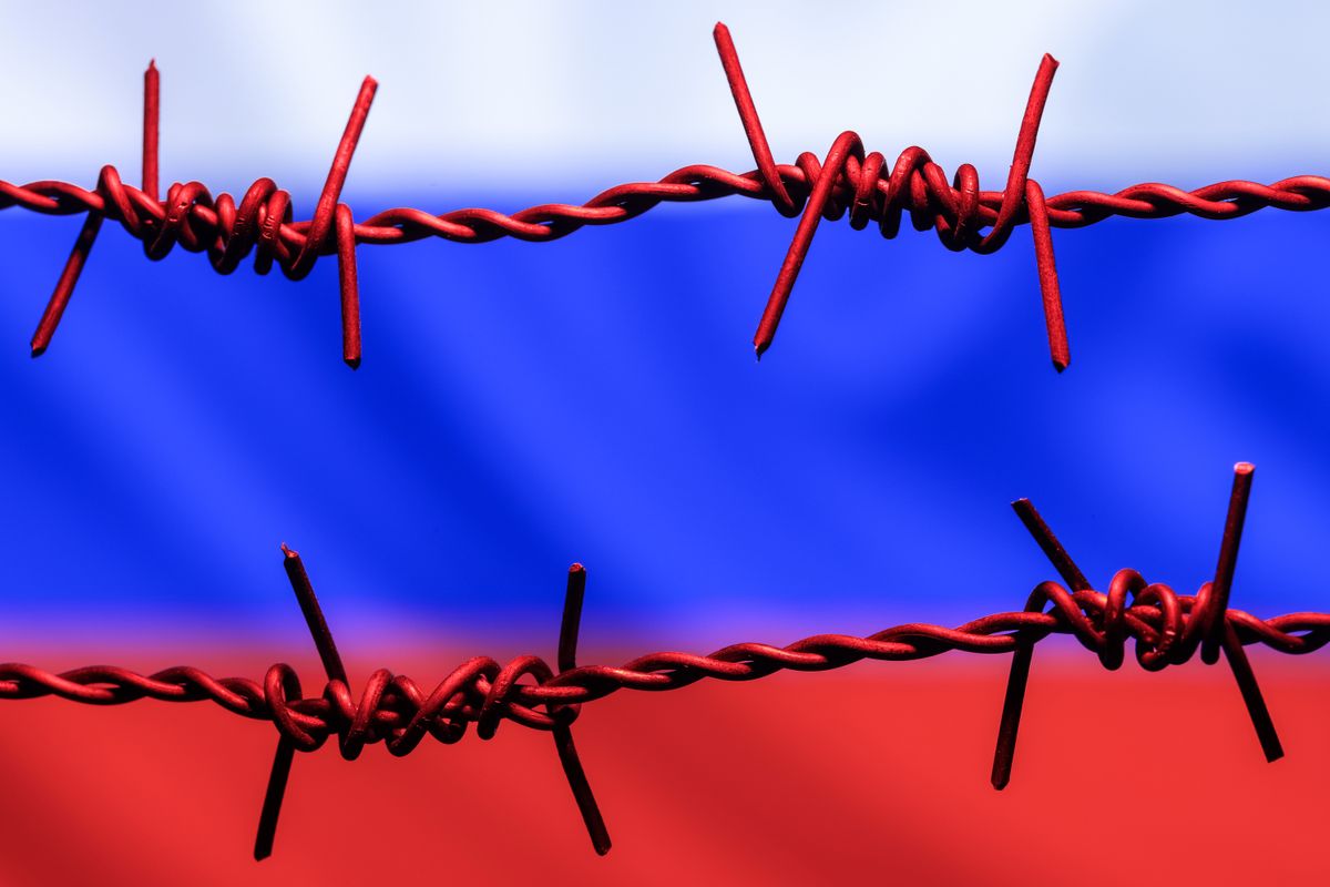Barbed,Wire,On,Background,Of,Flag,Of,Russia.,Sanctions,Against