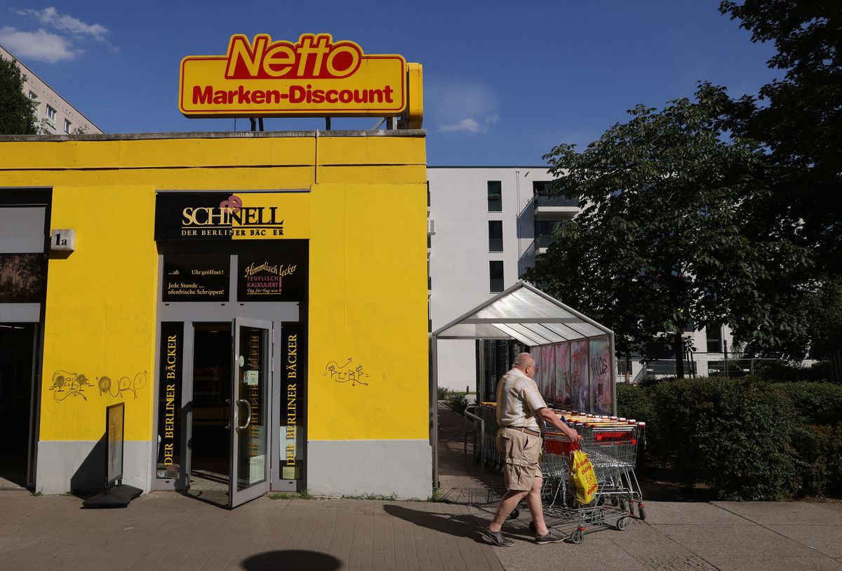 BERLIN, GERMANY - JUNE 15: A man carries bags of groceries after emerging from a supermarket on June 15, 2022 in Berlin, Germany. Inflation has skyrocketed in Germany since Russia's February military invasion of Ukraine. Analysts attribute the sharp rise in food prices to rising fuel and fertilizer costs, which have hit the agriculture sector acutely.