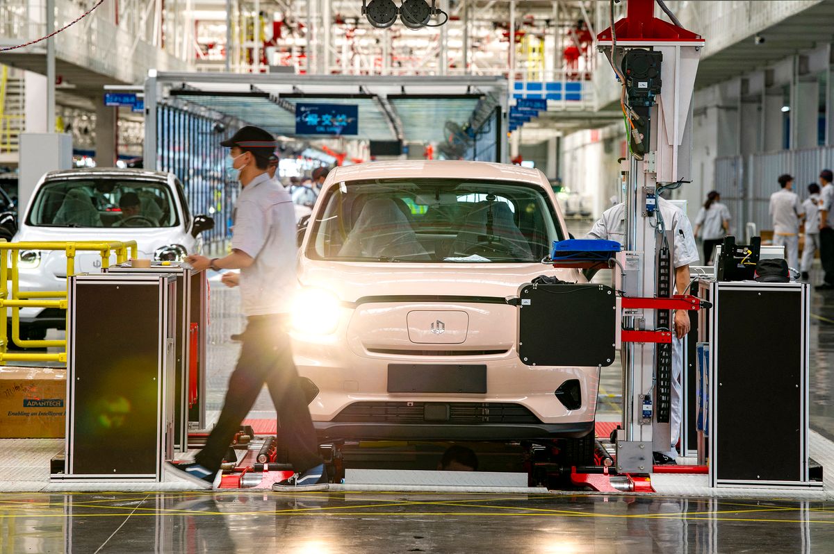 #CHINA-INDUSTRIAL PROFITS-GROWTH (CN) (220427) -- JINHUA, April 27, 2022 (Xinhua) -- A new energy car is inspected at the workshop of Chinese car manufacturer Leapmotor in Jinhua, east China's Zhejiang Province, April 26, 2022. Profits of China's major industrial firms rose 8.5 percent year on year in the first quarter of 2022, official data showed on Wednesday. (Photo by Hu Xiaofei/Xinhua) (Photo by Hu Xiaofei / XINHUA / Xinhua via AFP) #CHINA-INDUSTRIAL PROFITS-GROWTH (CN)