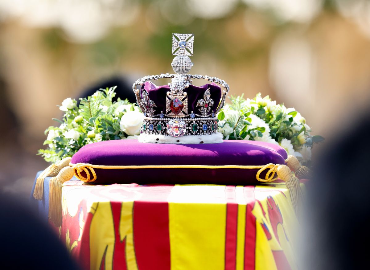 The Coffin Carrying Queen Elizabeth II Is Transferred From Buckingham Palace To The Palace Of Westminster, LONDON, UNITED KINGDOM - SEPTEMBER 14: (EMBARGOED FOR PUBLICATION IN UK NEWSPAPERS UNTIL 24 HOURS AFTER CREATE DATE AND TIME) Queen Elizabeth II's coffin, draped in the Royal Standard and bearing the Imperial State Crown, is transported on a gun carriage from Buckingham Palace to The Palace of Westminster ahead of her Lying-in-State on September 14, 2022 in London, United Kingdom. Queen Elizabeth II's coffin is taken in procession on a Gun Carriage of The King's Troop Royal Horse Artillery from Buckingham Palace to Westminster Hall where she will lay in state until the early morning of her funeral. Queen Elizabeth II died at Balmoral Castle in Scotland on September 8, 2022, and is succeeded by her eldest son, King Charles III. (Photo by Max Mumby/Indigo/Getty Images)