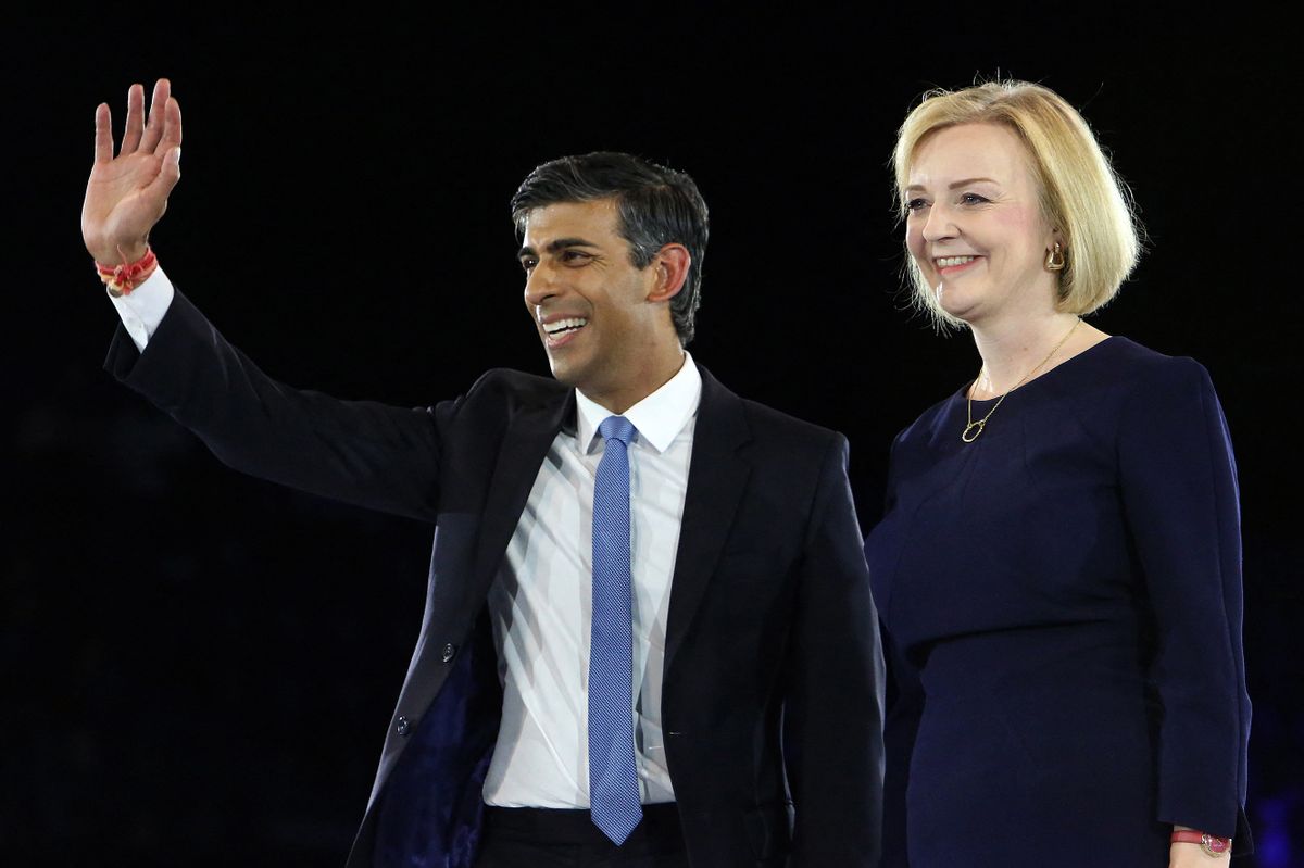 (FILES) In this file photo taken on August 31, 2022 Rishi Sunak, Britain's former Chancellor of the Exchequerm (L) and Britain's Foreign Secretary Liz Truss, the final two contenders to become the country's next Prime Minister and leader of the Conservative party, stand together on stage during the final Conservative Party Hustings event at Wembley Arena, in London. - The UK will learn on September 5, 2022 who will be its next prime minister, with foreign minister Liz Truss expected to be announced winner of a lengthy vote by Conservative Party members. The result will be announced at 12.30 pm (1130 GMT), after foreign minister Truss and her rival, former finance minister Rishi Sunak, spent the summer campaigning. 