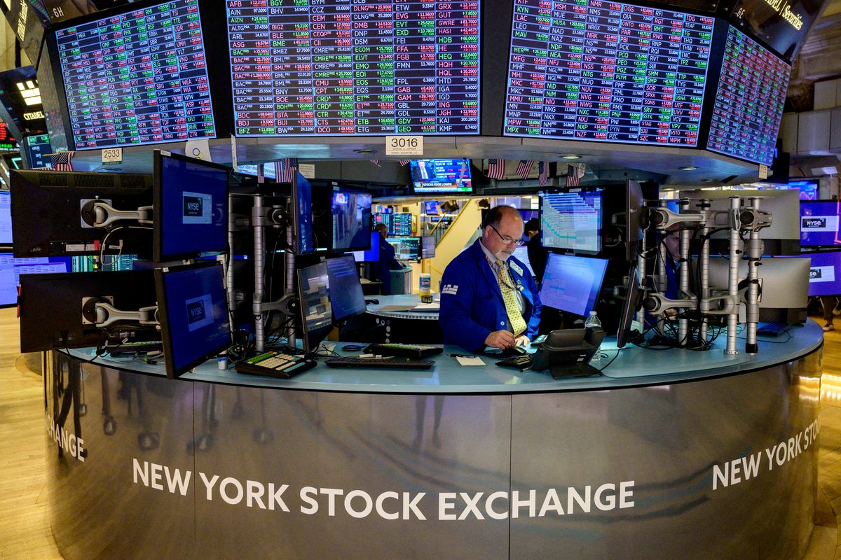 Traders work during the opening bell at the New York Stock Exchange (NYSE) on Wall Street in New York City on August 16, 2022. - Wall Street stocks were mostly lower early Tuesday following lackluster housing data and as Walmart results highlighted how inflation is altering consumer behavior. (Photo by ANGELA WEISS / AFP) US-STOCKS-MARKETS-OPEN