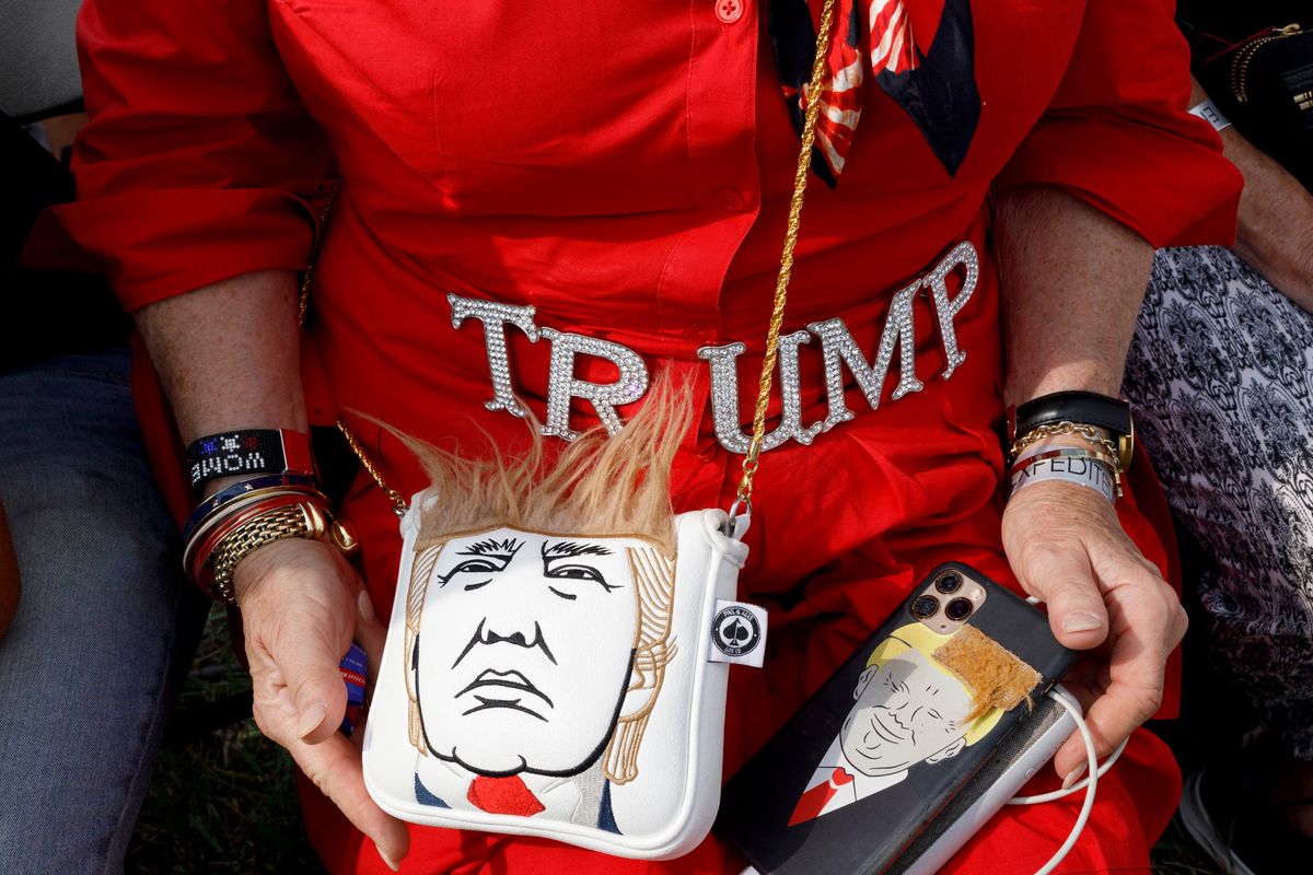 Donald Trump’s first public rally since leaving the White House A supporter shows off her Trump paraphernalia during a Trump campaign-style rally in Wellington, Ohio, June 26, 2021. - Modzelewski said he’s a "Trump Believer" meaning, "I want freedom and I don’t want to be bound by the democratic party." Donald Trump held his first big campaign-style rally since leaving the White House, giving a vintage, rambling speech Saturday to an adoring audience as he launched a series of appearances ahead of next year's midterm elections.The former president, who has been booted from social media platforms and faces multiple legal woes, has flirted with his own potential candidacy in 2024, but in the 90-minute address at a fair grounds in Ohio he made no clear mention of his political future, even when the crowd chanted "four more years! four more years!" (Photo by STEPHEN ZENNER / AFP)