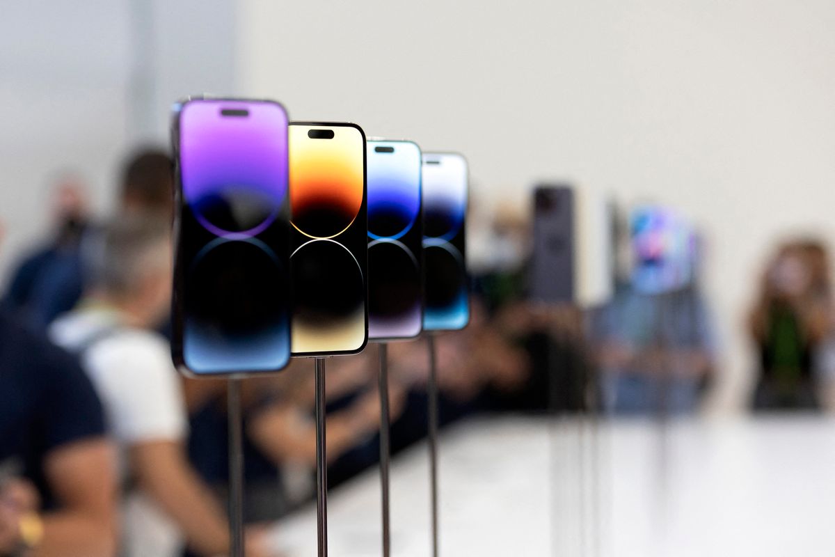 The new iPhone 14 and 14 Plus is displayed during a launch event for new products at Apple Park in Cupertino, California, on September 7, 2022. - Apple unveiled several new products including a new iPhone 14 and 14 Pro, three Apple watches, and new AirPod Pros during the event. (Photo by Brittany Hosea-Small / AFP)