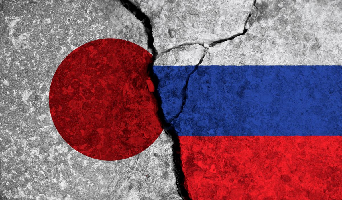 Political,Relationship,Between,Japan,And,Russia.,National,Flags,On,Cracked