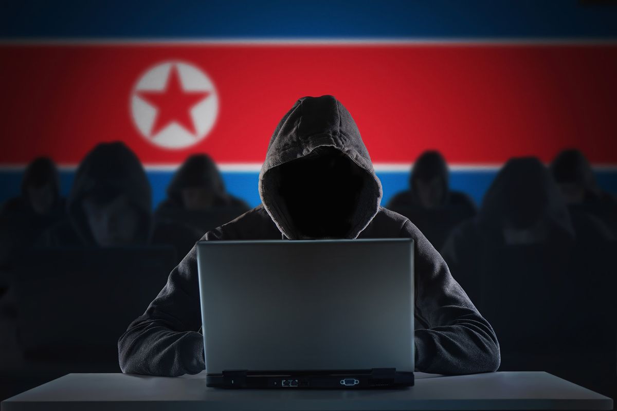 Many Korean hackers in troll farm. Security and cyber crime concept. Korea flag in background.