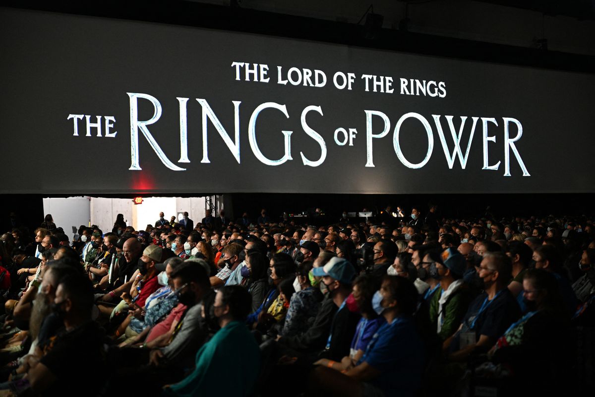 (FILES) In this file photo taken on July 22, 2022 Fans attend "The Lord of the Rings: The Rings of Power" panel in Hall H of the Convention Center during Comic-Con International on July 22, 2022 in San Diego, California. - Amazon's $1 billion gamble on "The Lord of the Rings: The Rings of Power," a 50-hour television series based on the dry historical footnotes published at the end of book three, premieres September 2, 2022, globally on Prime Video, aims to tap into the huge and enduring appeal of works still regularly voted the world's best-loved novels of all time, as well as Peter Jackson's Oscar-winning film adaptations. 