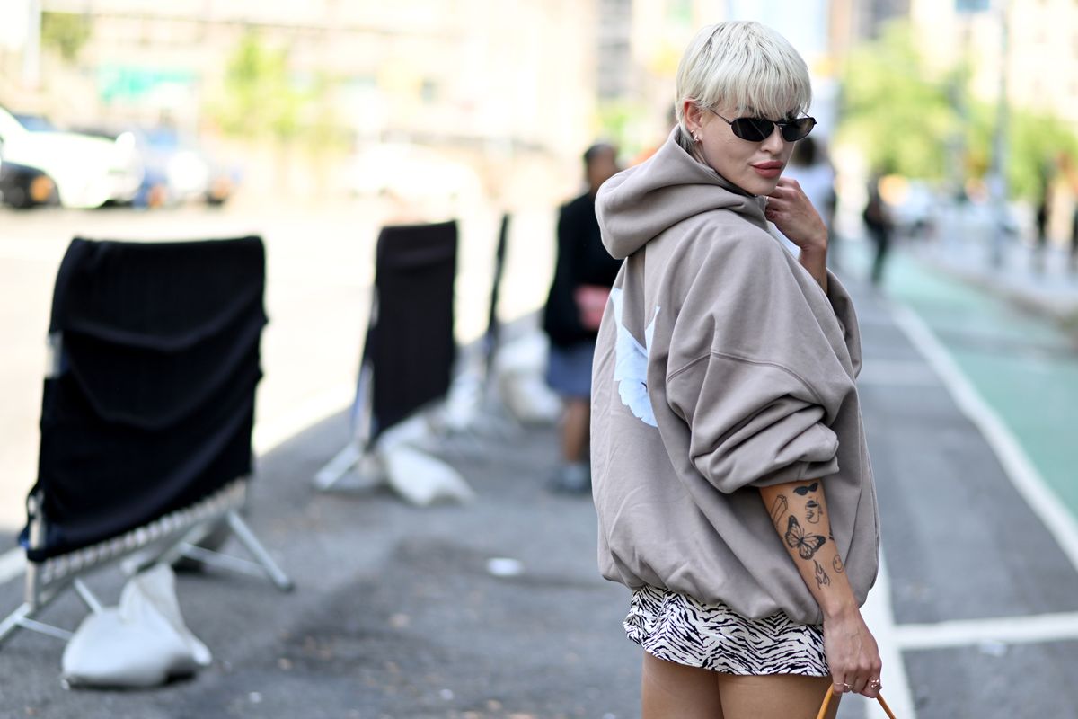 Street Style - September 2022 - New York Fashion Week
NEW YORK, NEW YORK - SEPTEMBER 10: Veronica Guilty is seen wearing a Yeezy Gap Baleciaga hoodie, dress by Reformation, shoes Marine Serre and a bag by Jacquemus to NYFW at Spring Studios on September 10, 2022 in New York City.  (Photo by Alexi Rosenfeld/Getty Images)