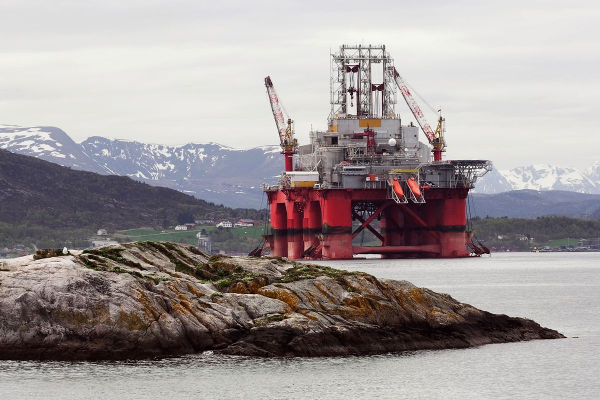 Oil rig in fjord landscape Oil rig in norwegian fjord  landscape