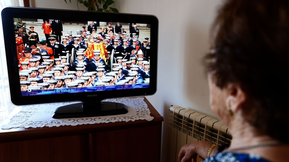 Elderly Woman Watches Queen Elizabeth II Funeral On TV