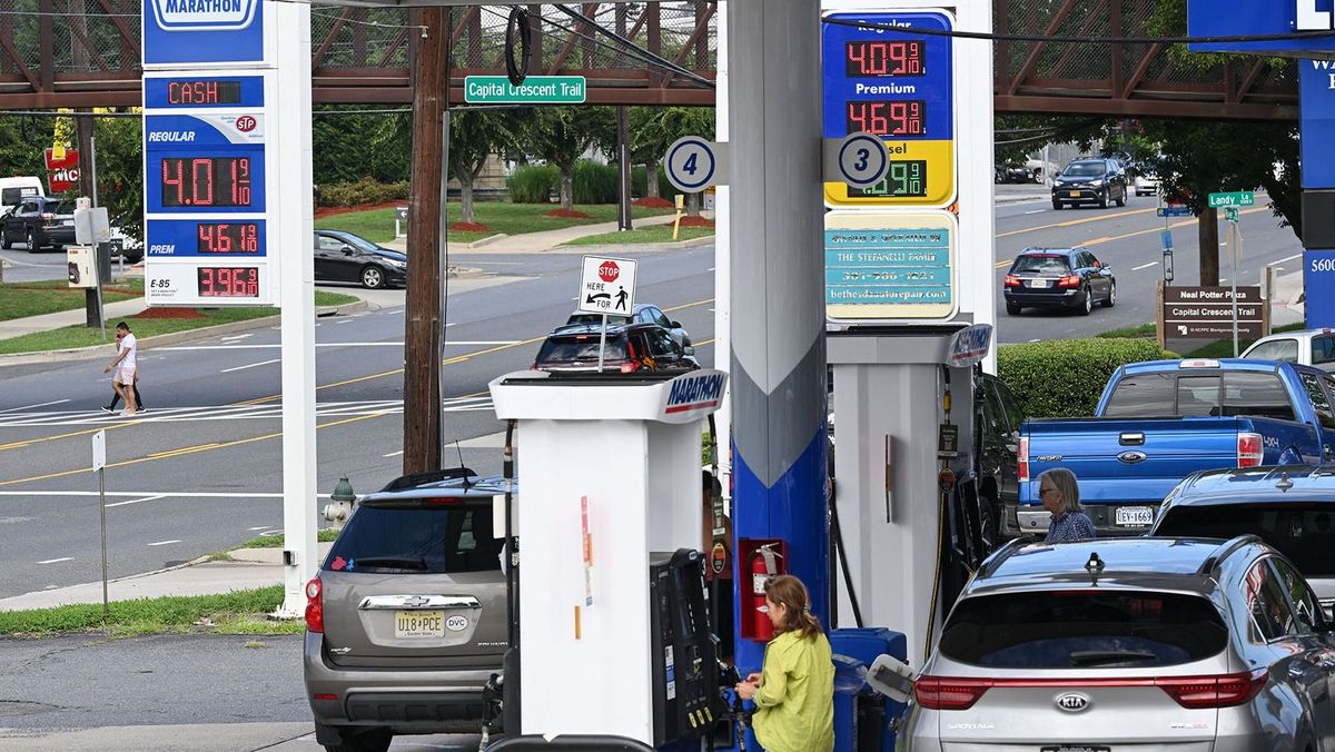 Gas station prices are seen in Bethesda, Maryland on August 11, 2022. - The US average price of gasoline at the pump has finally fallen below $4.00 a gallon, providing a bit of relief for Americans struck by massive inflation at almost every turn. (Photo by MANDEL NGAN / AFP)