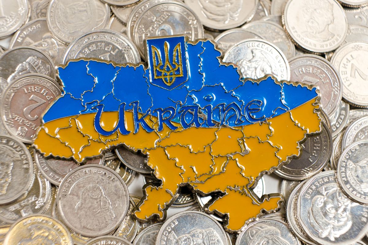 Map,Of,Ukraine,On,Ukrainian,Hryvnia,Coins.,Money,Crisis,In