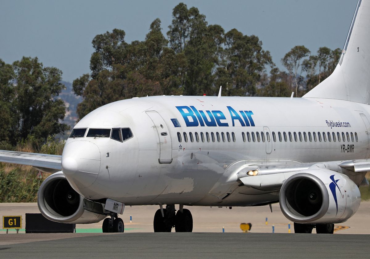Boeing 737-7K2, from Blue Air company at Barcelona airport, in Barcelona, on 20th August 2022.  -Blue Air, the biggest privately-owned Romanian airline, will suspend all of its flights that were supposed to take off from Romanian airports until Monday, September 12. The company says it was forced to take this decision after the Environment Ministry blocked all of its bank accounts.  