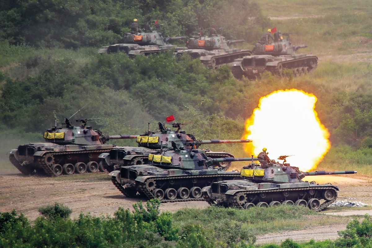 Taiwan Military Live-fire Training Amid Increasing Tensions With China, CM-11 tanks fire artillery during the 2-day live-fire drill, amid intensifying threats military from China, in Pingtung county, Taiwan, 7 September 2022. Taipei has been receiving more arms sales and weapons from the US, while fostering its ties with countries like Japan, the UK, Canada and India, as Beijing vows to unify Taiwan without excluding the possibility of using force. (Photo by Ceng Shou Yi/NurPhoto) (Photo by Ceng Shou Yi / NurPhoto / NurPhoto via AFP)