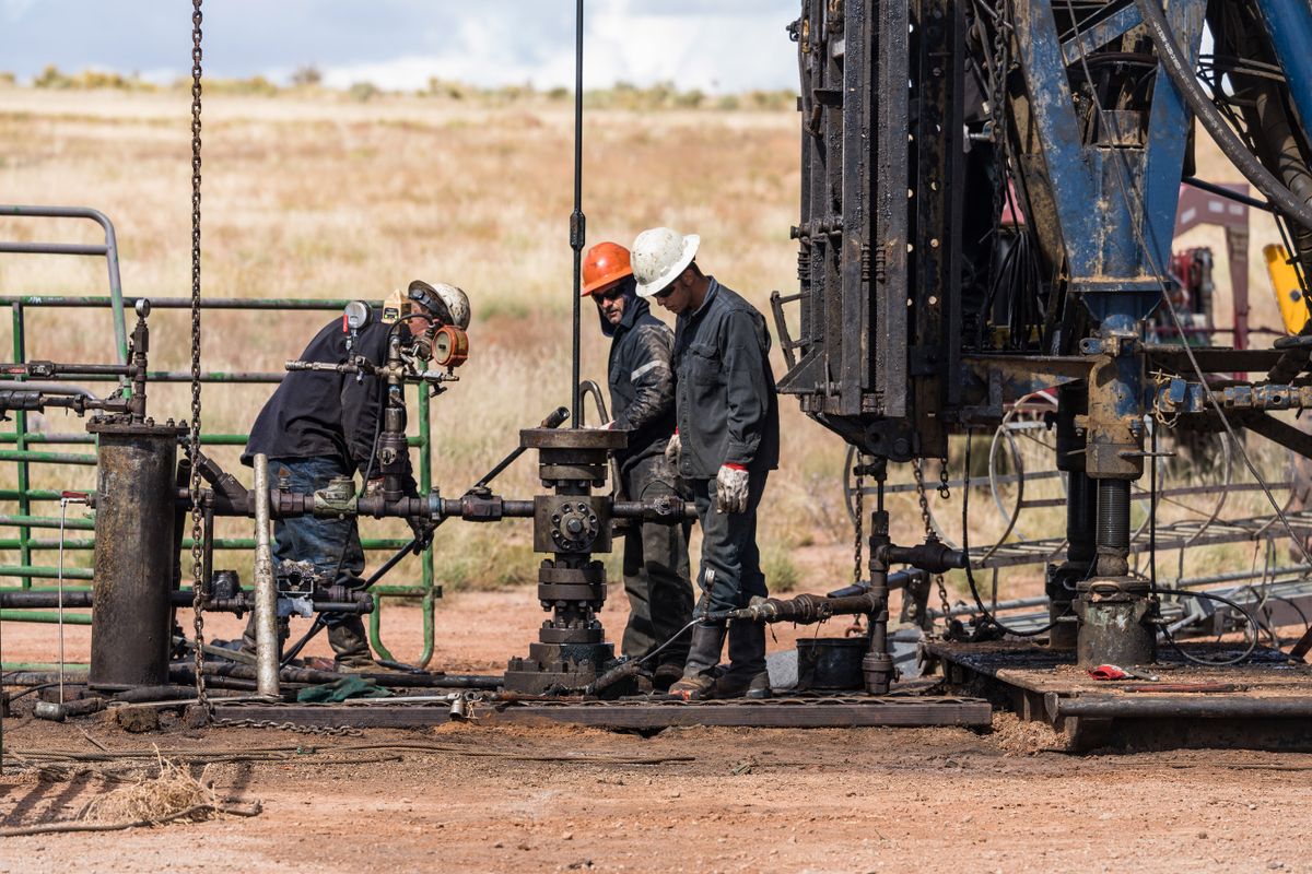 The well service crew on a workover rig works on an oil well to try to bring it back into service.. 