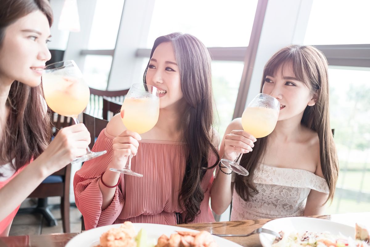 beauty women smile and dine in restaurant