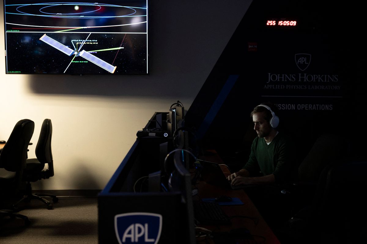 A man sits at his workstation within the Mission Operations Center during the Double Asteroid Redirection Test (DART) Technology Media Workshop Telecon Briefing and tour at the Johns Hopkins Applied Physics Laboratory in Laurel, Maryland, on September 12, 2022, ahead of the September 26th project test mission. - The goal of the DART mission, which launched in November 2021, is to hit an asteroid with a spacecraft to slightly alter its trajectory.