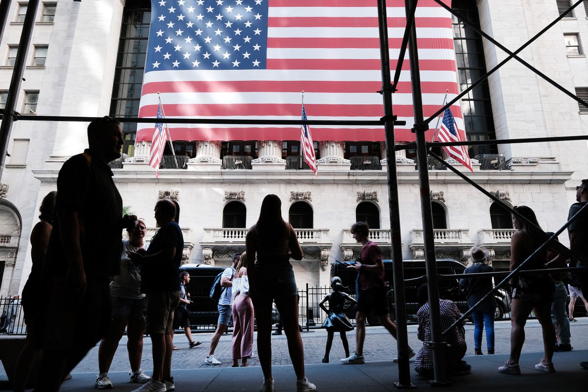 NEW YORK, NEW YORK - SEPTEMBER 01: People walk by the New York Stock Exchange (NYSE) on September 01, 2022 in New York City. Stocks rose in late afternoon trading on the first day of September as investors looked forward to the jobs report Friday. 