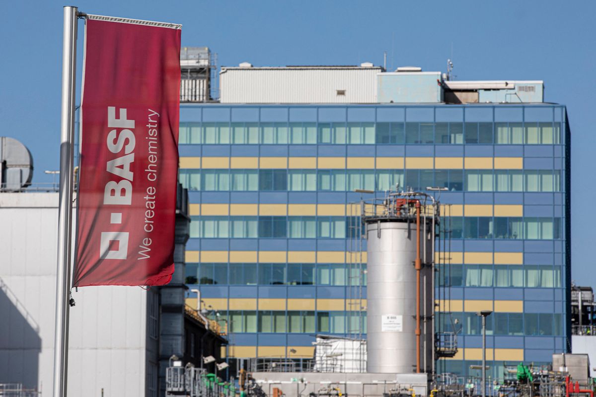 A corporate flag waves at the headquarters of German chemical company BASF in Ludwigshafen, Rhineland-Palatinate, western Germany, on October 5, 2022. 