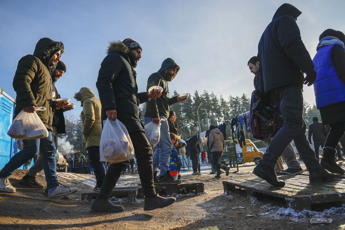 Migrants at Belarus border continue to wait at a closed area, 